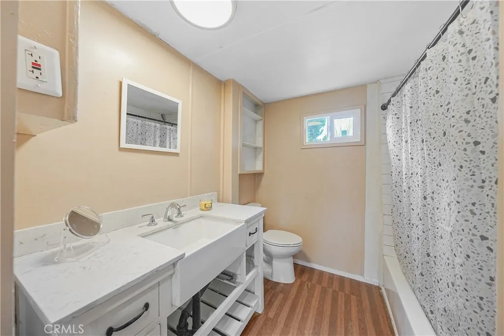 8787 Locust, Unit 24 Fontana, CA 92335 - Photo 19 of 27 a bathroom with a sink and a mirror