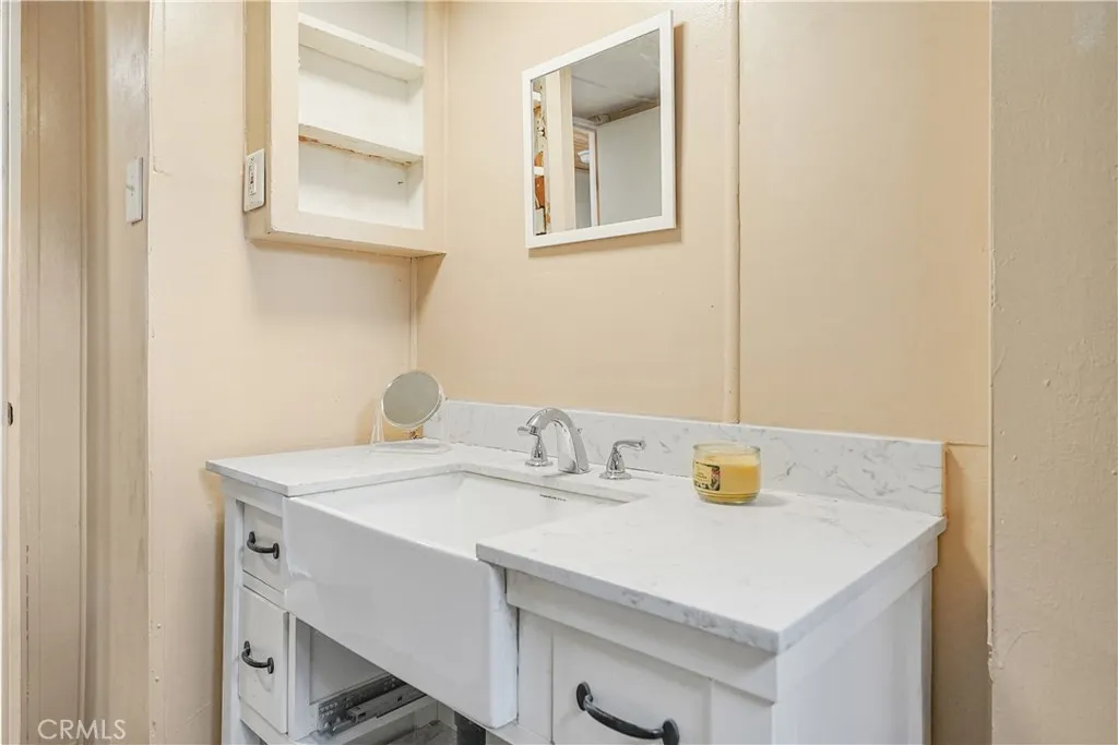 8787 Locust, Unit 24 Fontana, CA 92335 - Photo 21 of 27 a bathroom with a sink and a vanity