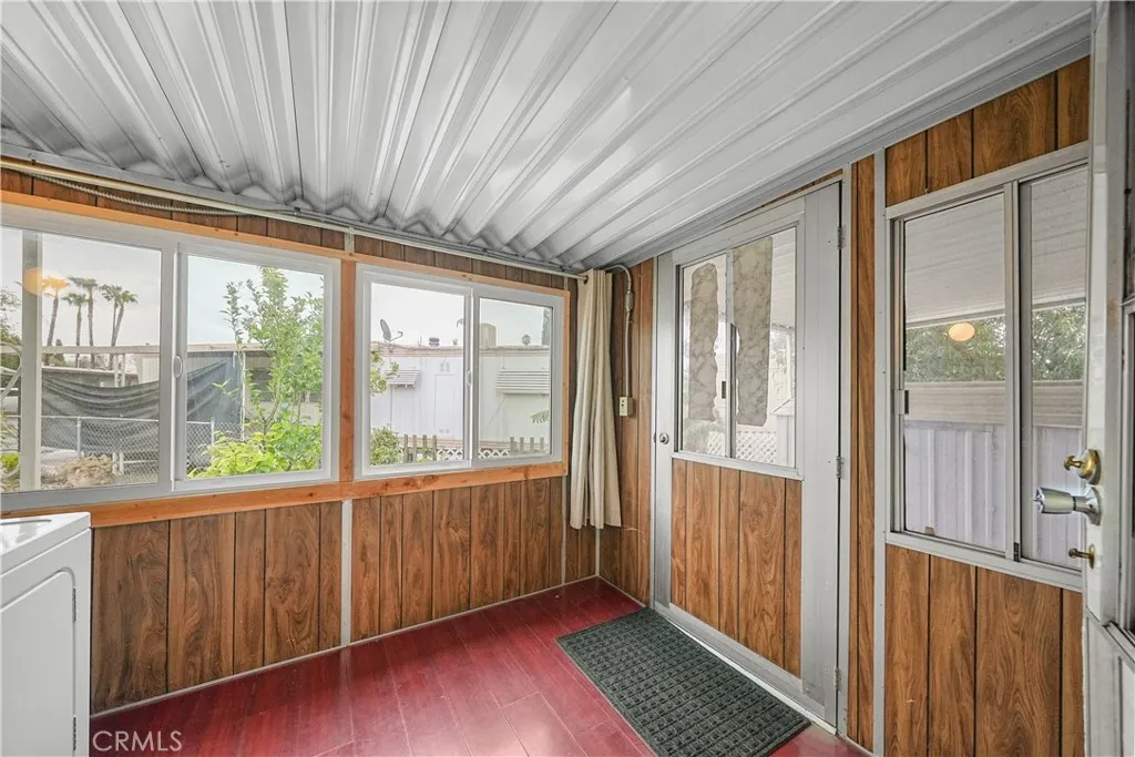 8787 Locust, Unit 24 Fontana, CA 92335 - Photo 24 of 27 a view of an entryway with wooden floor