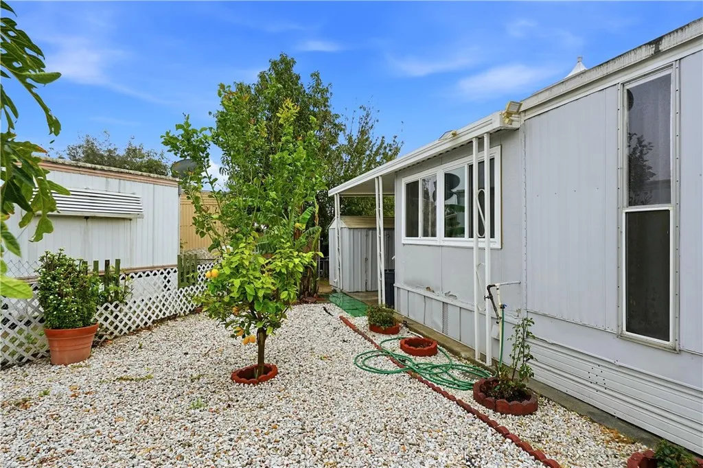 8787 Locust, Unit 24 Fontana, CA 92335 - Photo 3 of 27 a house view with a garden space