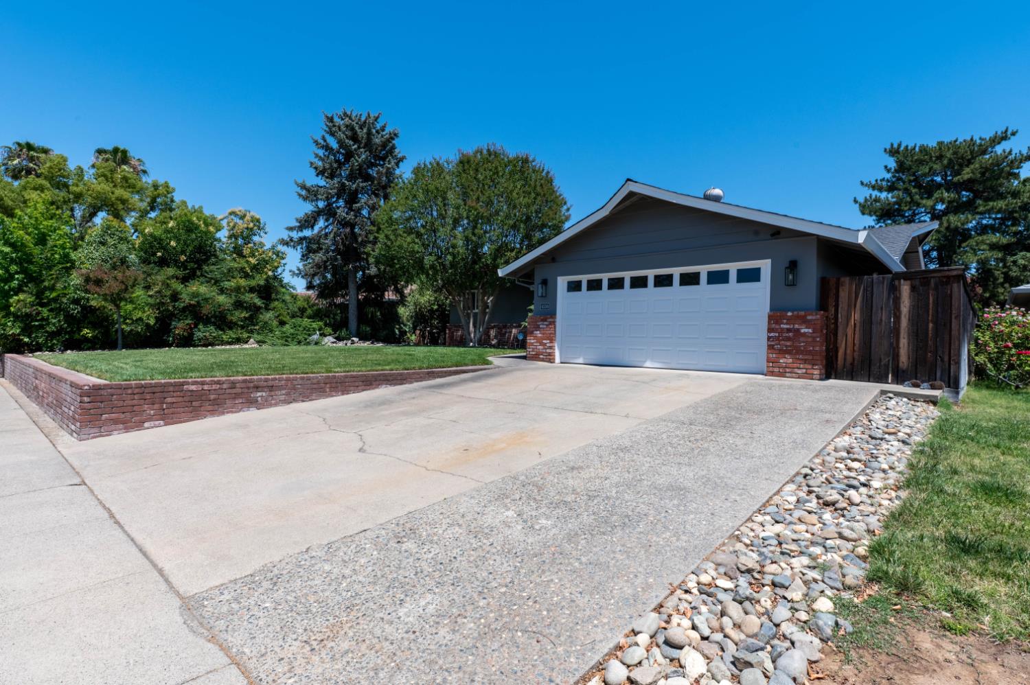 4530 Bela Way Carmichael, CA 95608 - Photo 2 of 36 2-car extended garage with spacious driveway.
