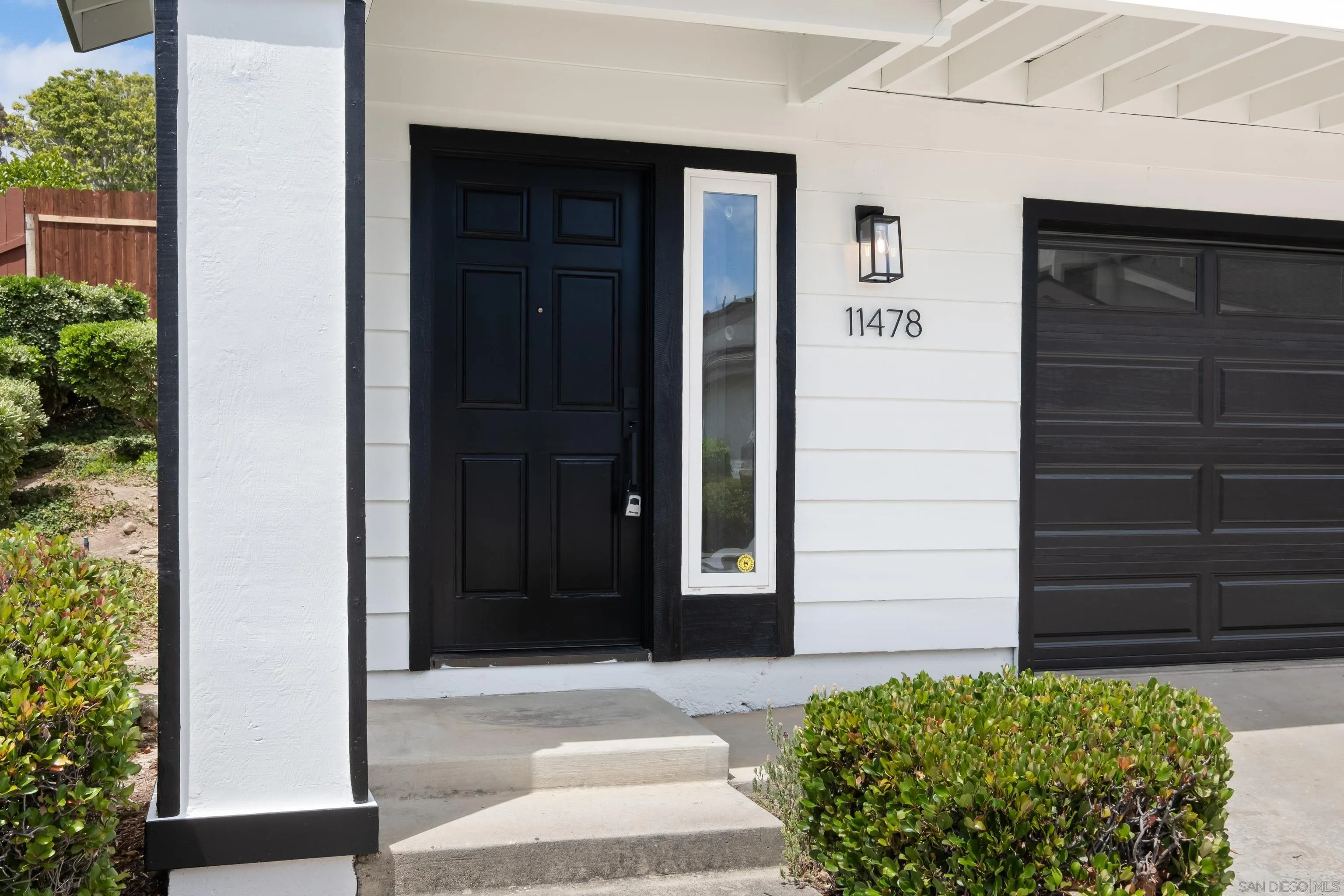11478 Madera Rosa Way San Diego, CA 92124 - Photo 3 of 54 a view of front door and a window