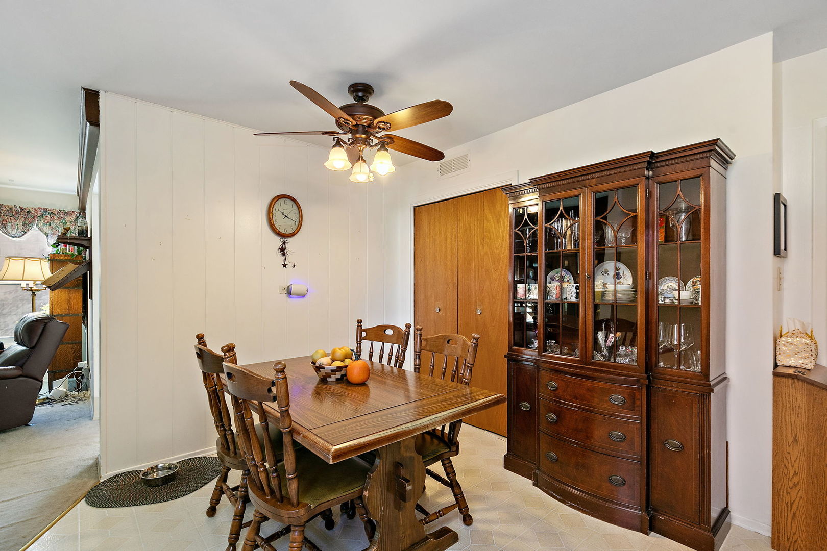 1410 Nottingham Lane Hoffman Estates, IL 60169 - Photo 13 of 29 a view of a dining room with furniture and chandelier