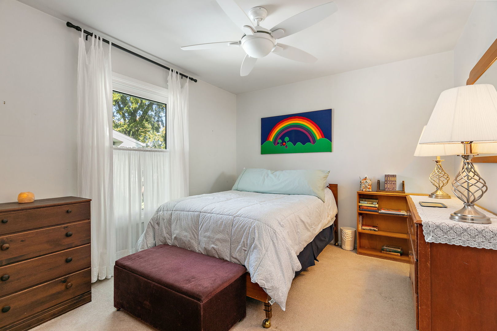 1410 Nottingham Lane Hoffman Estates, IL 60169 - Photo 19 of 29 a bedroom with a bed and dresser