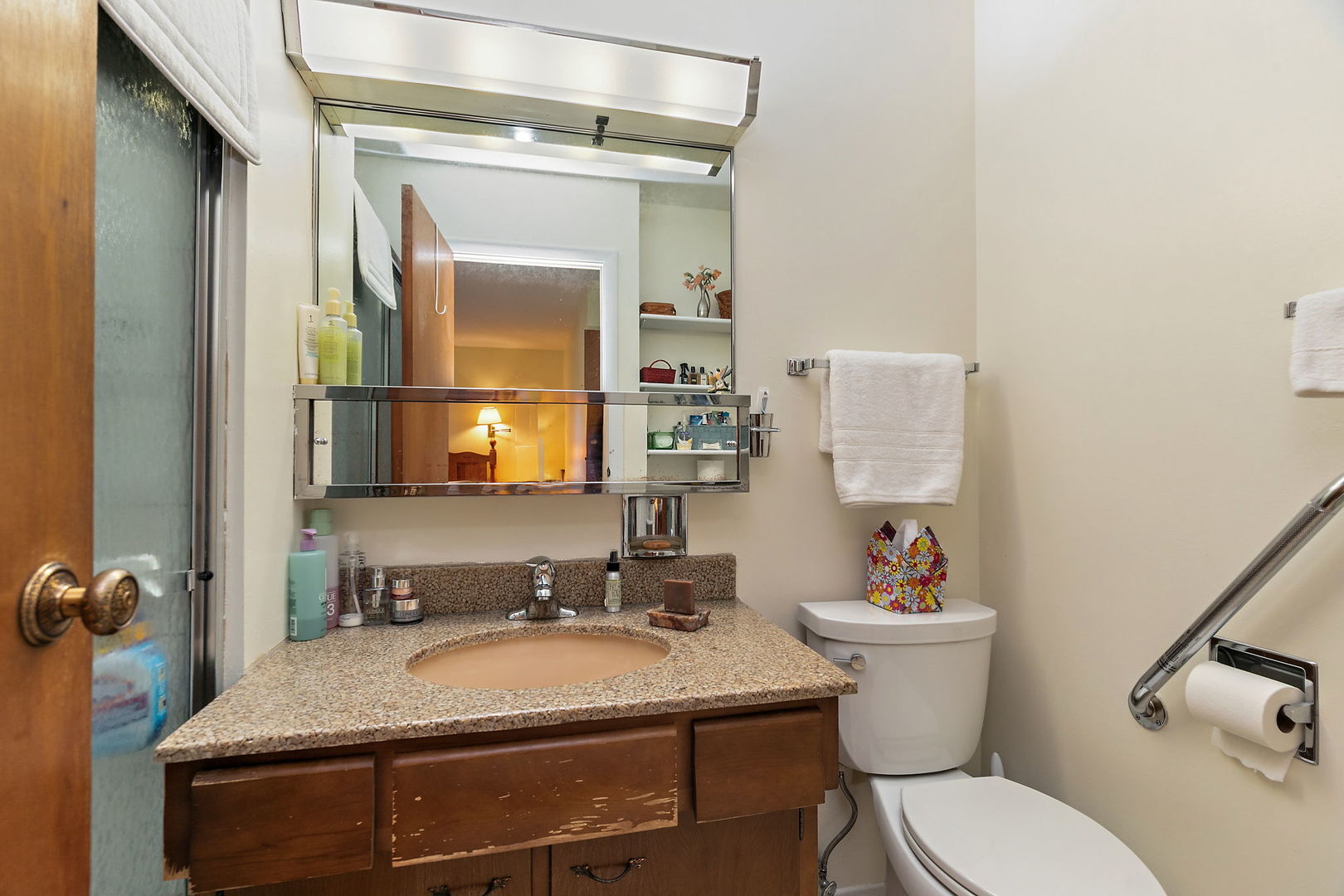 1410 Nottingham Lane Hoffman Estates, IL 60169 - Photo 23 of 29 a bathroom with a granite countertop sink mirror vanity and toilet