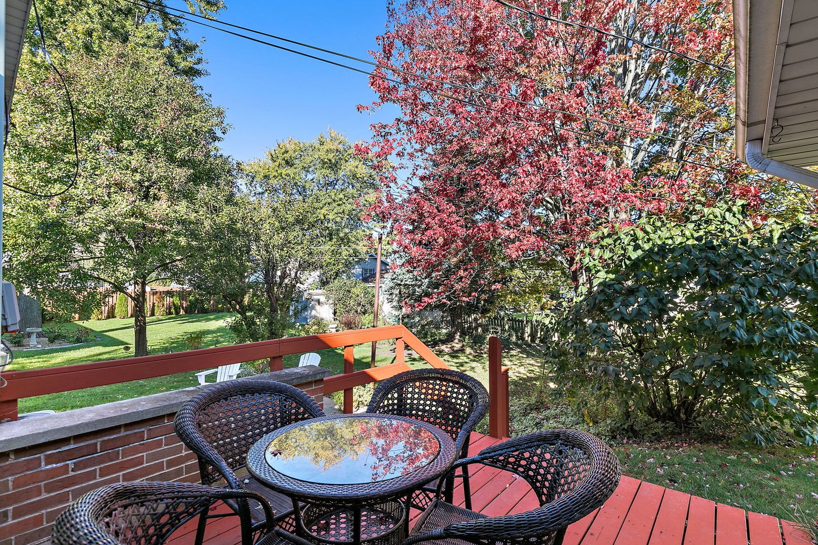 1410 Nottingham Lane Hoffman Estates, IL 60169 - Photo 26 of 29 a backyard of a house with fire pit and outdoor seating