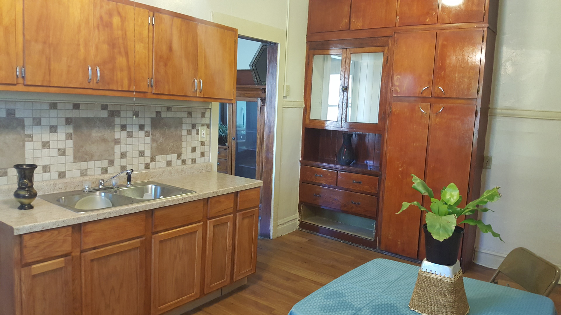 6844 South Normal Boulevard Chicago, IL 60621 - Photo 13 of 18 a kitchen with sink and refrigerator