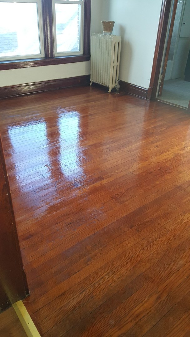6844 South Normal Boulevard Chicago, IL 60621 - Photo 10 of 18 a view of room with window and hardwood floor