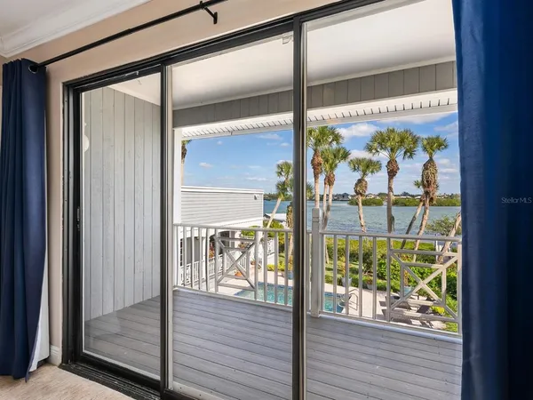 a bathroom with a sink mirror vanity and a toilet