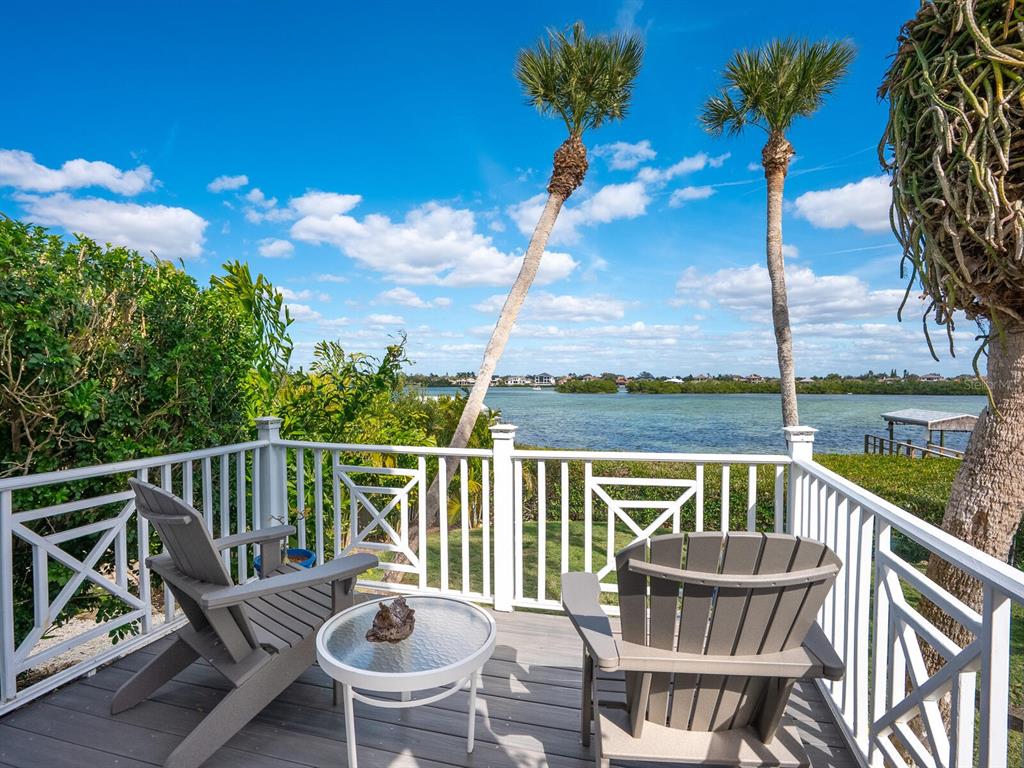 3240 Casey Key Road Nokomis, FL 34275 - Photo 30 of 51 a view of a balcony with chairs