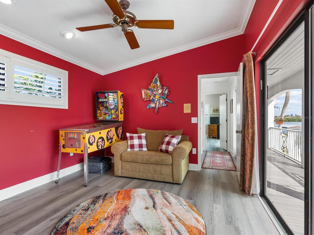 3240 Casey Key Road Nokomis, FL 34275 - Photo 41 of 51 a living room with furniture and wooden floor