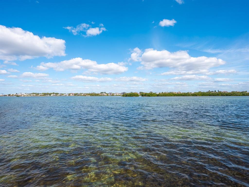 3240 Casey Key Road Nokomis, FL 34275 - Photo 46 of 51 a view of a lake and beach