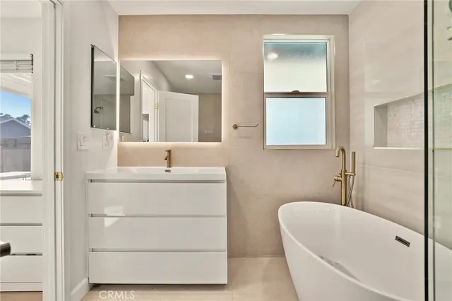 a room with a bed and a window