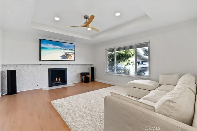 a view of a bedroom with workspace and a window