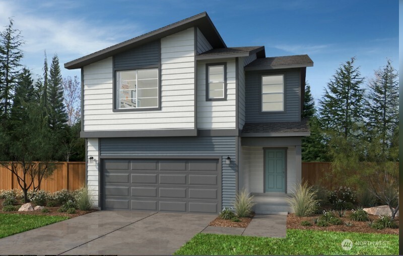 3516 237th Street Southeast, Unit 46 Bothell, WA 98021 - Photo 1 of 3 a front view of a house with a garden