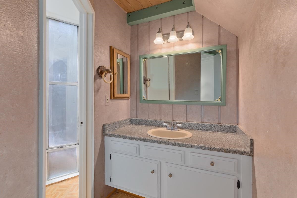 286 Old Mammoth Road, Unit 59 Mammoth Lakes, CA 93546 - Photo 14 of 31 a bathroom with a sink vanity and a mirror