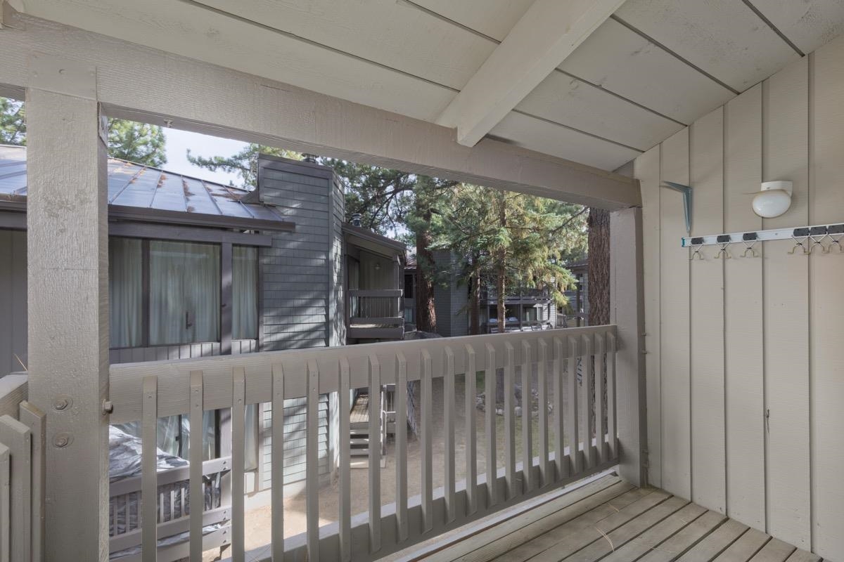286 Old Mammoth Road, Unit 59 Mammoth Lakes, CA 93546 - Photo 21 of 31 a view of a porch with furniture and wooden floor