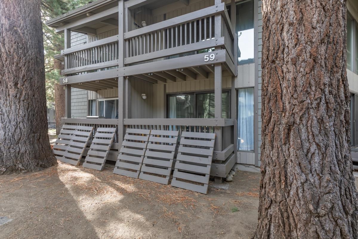 286 Old Mammoth Road, Unit 59 Mammoth Lakes, CA 93546 - Photo 25 of 31 front view of a house with a small yard