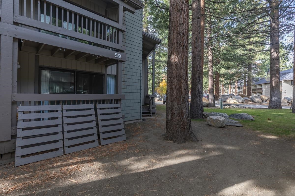 286 Old Mammoth Road, Unit 59 Mammoth Lakes, CA 93546 - Photo 26 of 31 a view of a house with a yard