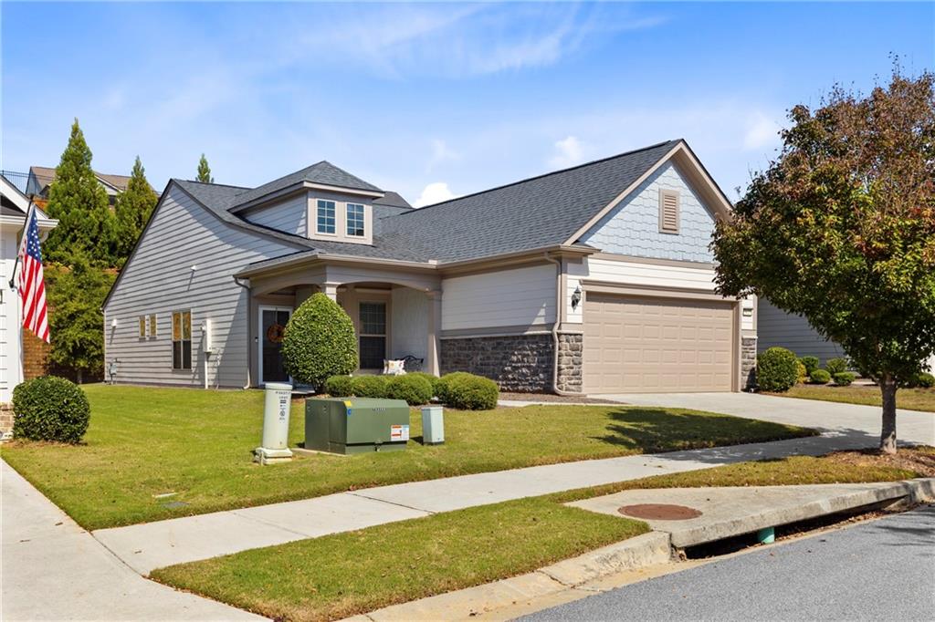 a front view of a house with a yard