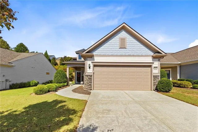 a view of a house with a yard