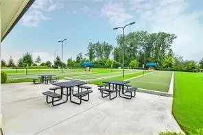 a view of a table and chairs in the patio