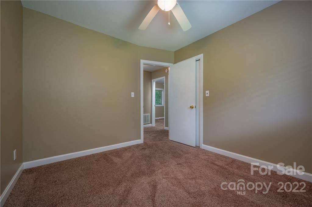 136 Crestview Street Rutherfordton, NC 28139 - Photo 13 of 34 an empty room with a bathroom