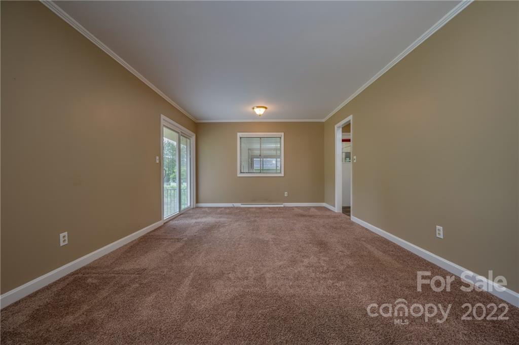 136 Crestview Street Rutherfordton, NC 28139 - Photo 14 of 34 a view of an empty room with a window