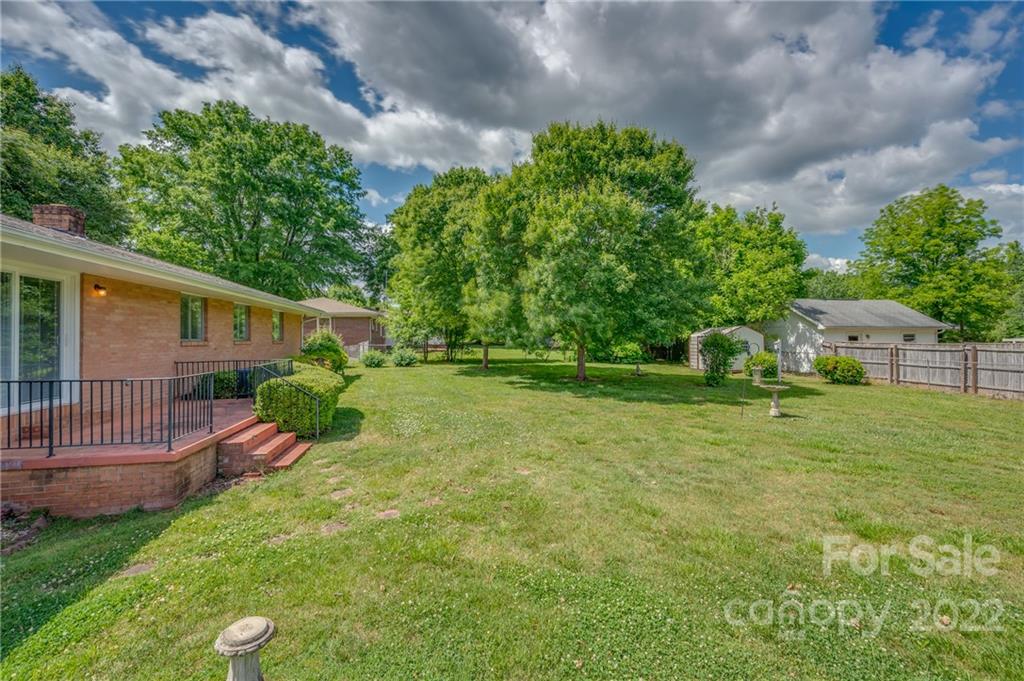 136 Crestview Street Rutherfordton, NC 28139 - Photo 29 of 34 a view of a house with a yard and sitting area