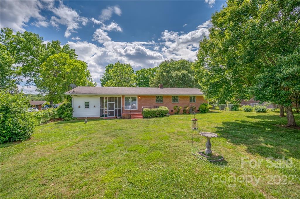 136 Crestview Street Rutherfordton, NC 28139 - Photo 30 of 34 a front view of a house with a garden