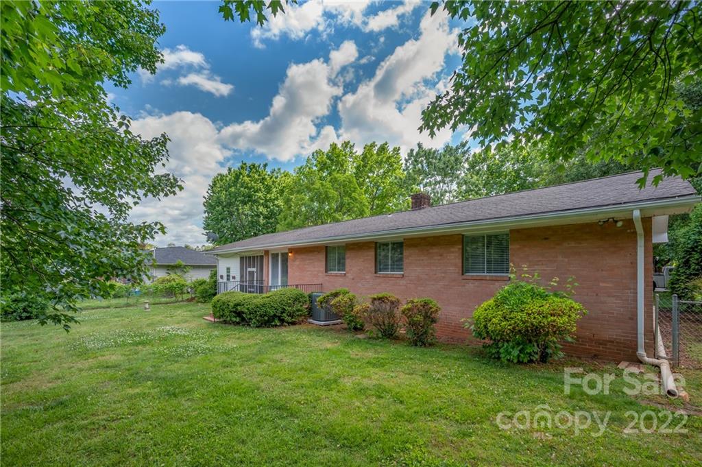136 Crestview Street Rutherfordton, NC 28139 - Photo 32 of 34 a view of a house with a yard