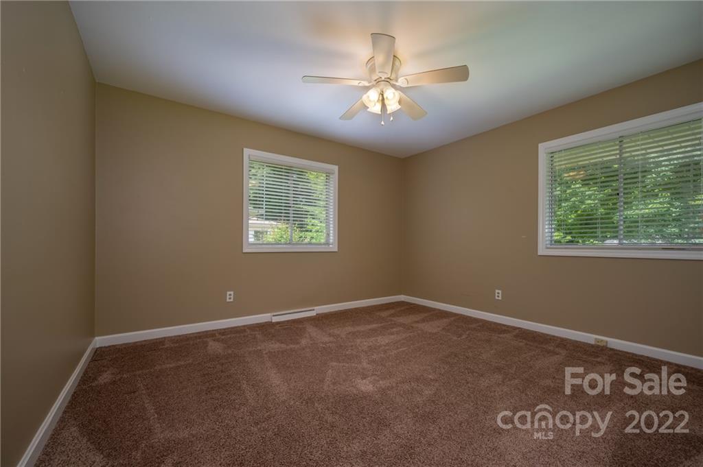 136 Crestview Street Rutherfordton, NC 28139 - Photo 10 of 34 a view of an empty room with a window