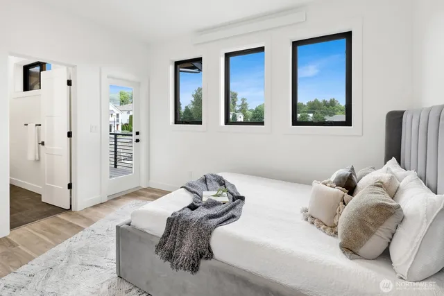a kitchen with cabinets and window