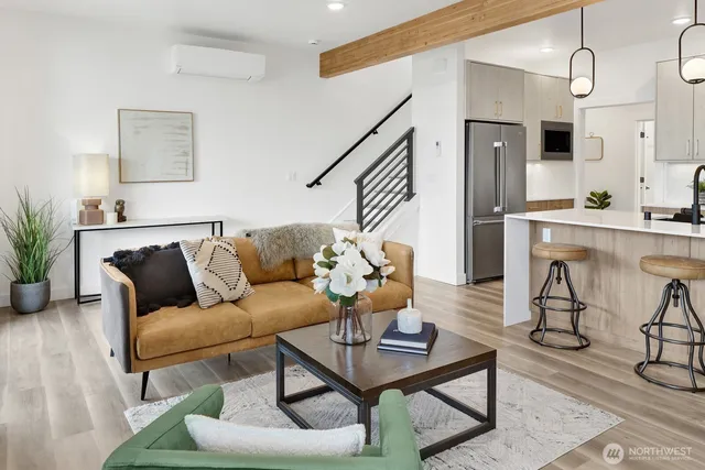 a view of a hallway with a dining room and glass door