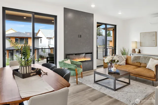 a kitchen with stainless steel appliances a sink microwave stove refrigerator and cabinets