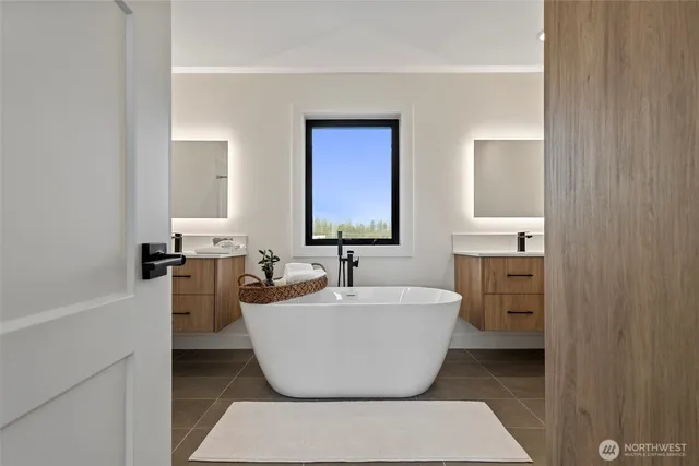 a bathroom with a sink and mirror