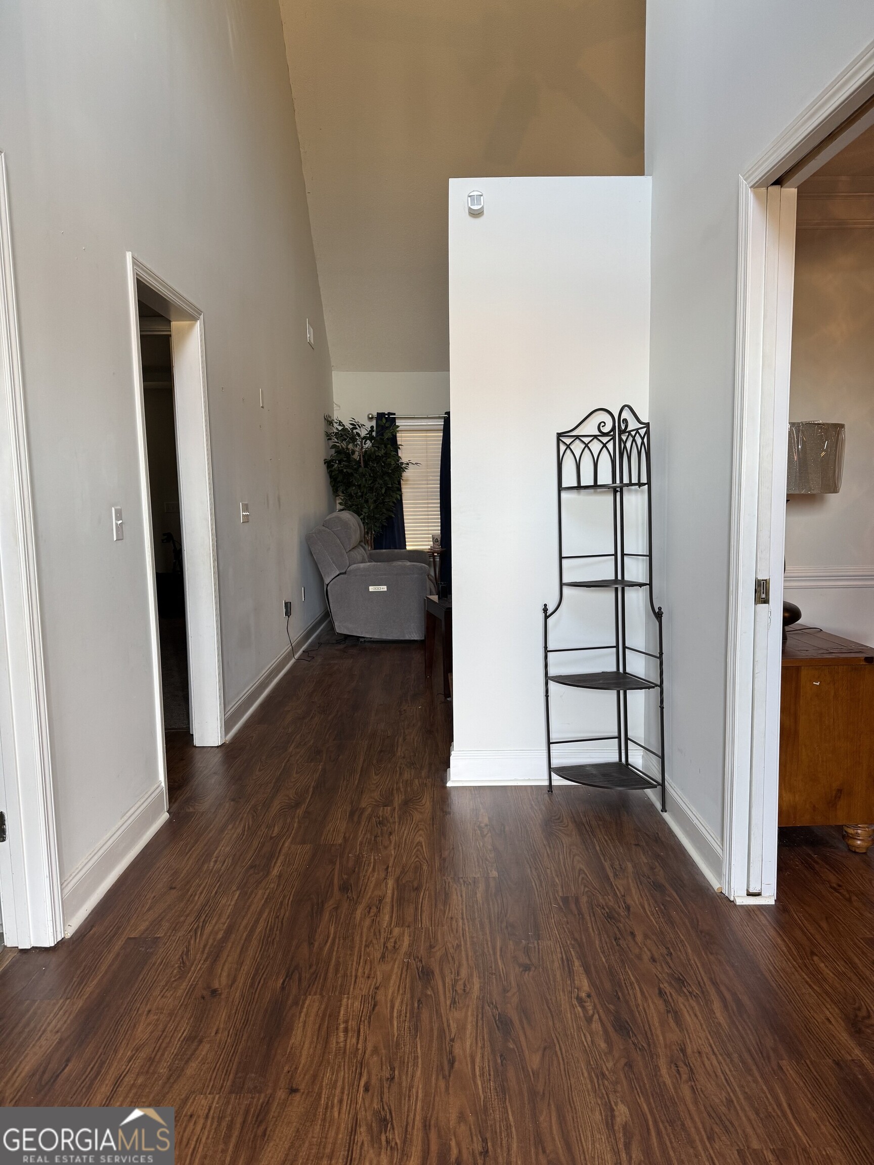 2132 Kings Chapel Road Perry, GA 31069 - Photo 6 of 13 wooden floor in an empty room with a window