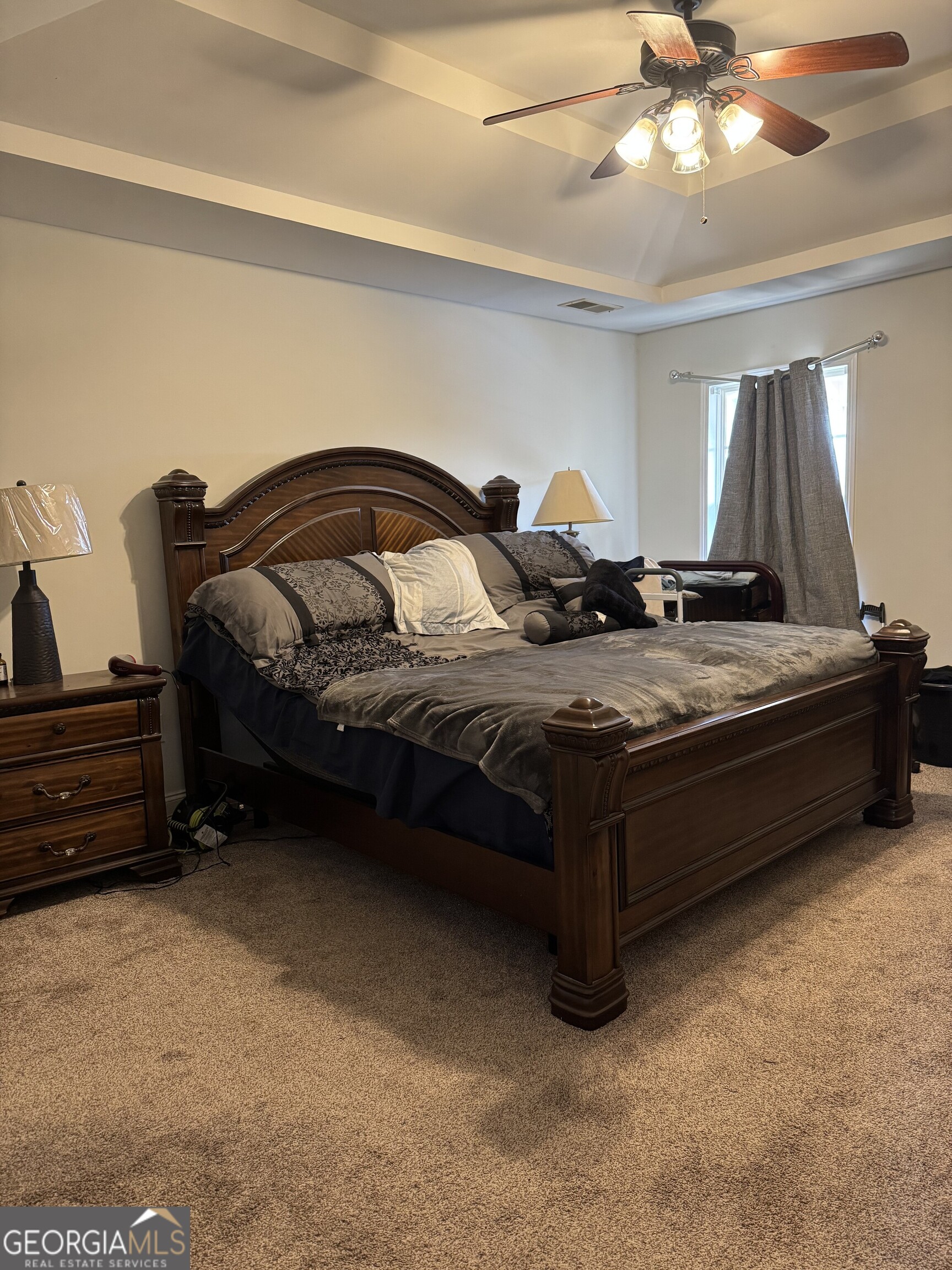 2132 Kings Chapel Road Perry, GA 31069 - Photo 9 of 13 a bedroom with bed and window