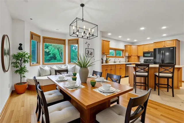 a view of a dining room with furniture window and outside view