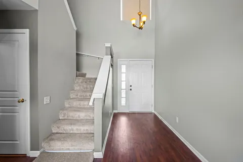 a view of entryway with wooden floor