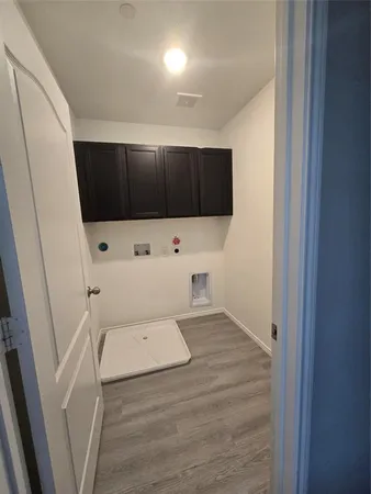 a utility room with washer and dryer