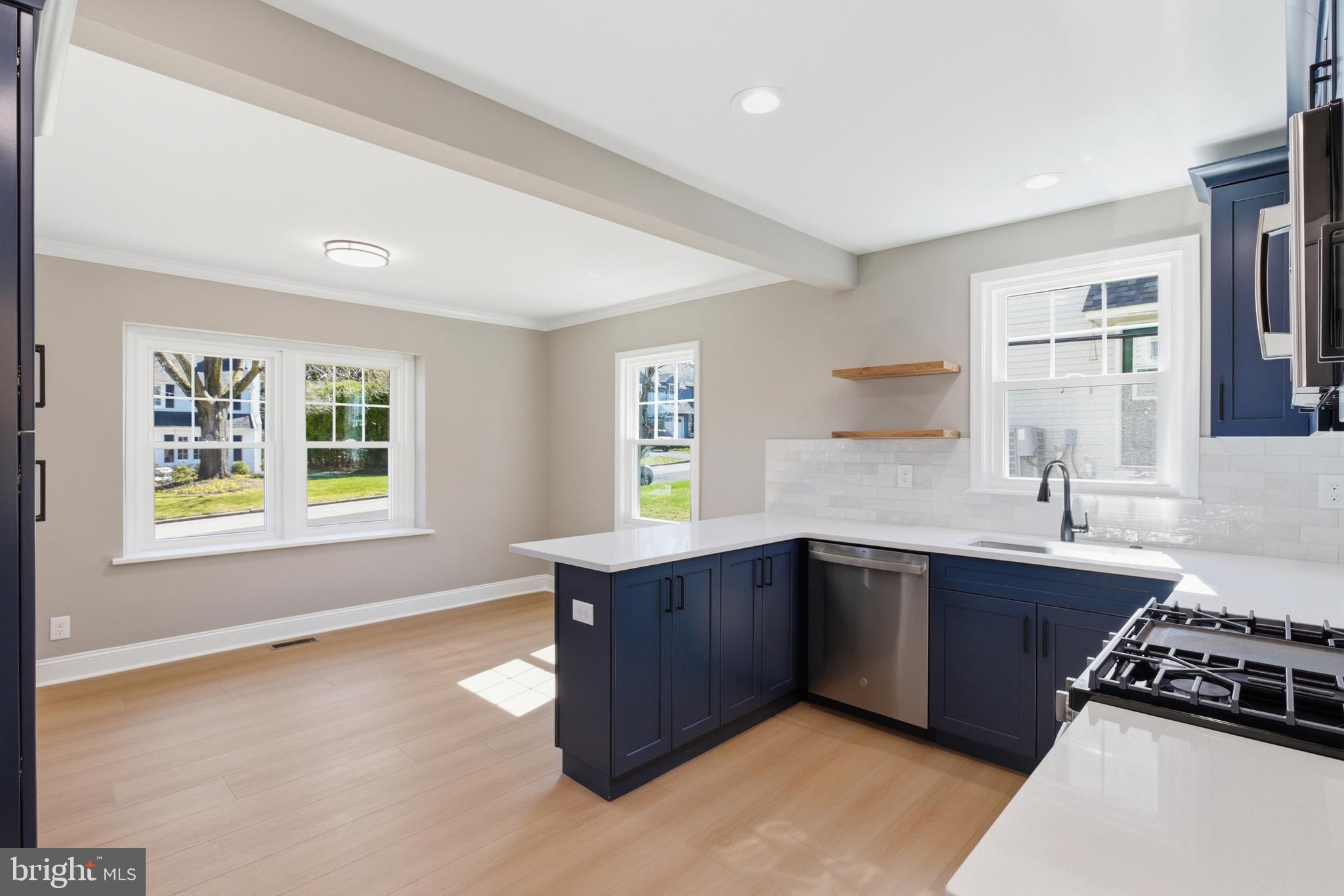 310 Greenhill Road Willow Grove, PA 19090 - Photo 22 of 35 Island from Kitchen into Dining area