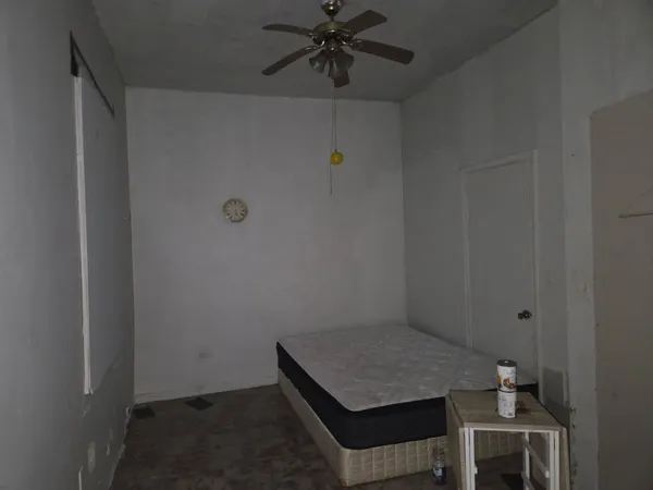 a bathroom with a sink toilet and mirror