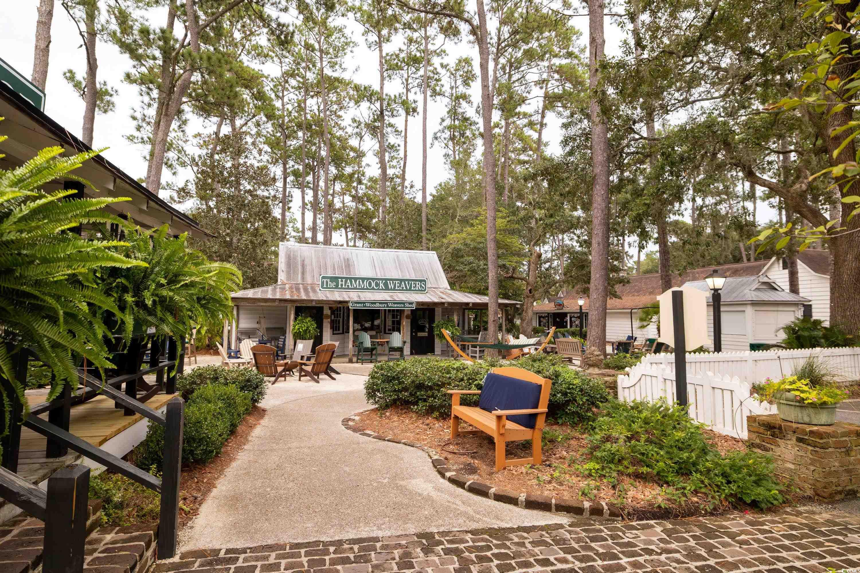 64 Condor Court Pawleys Island, SC 29585 - Photo 8 of 15 View of a document with a collage of images