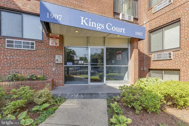 a view of a brick building with a large window