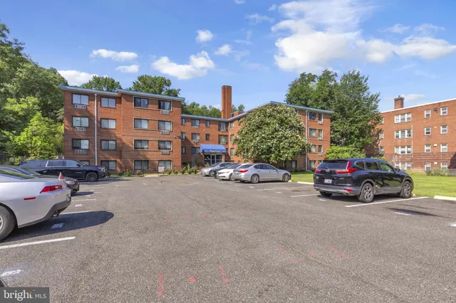 a view of a cars parked in front of a house