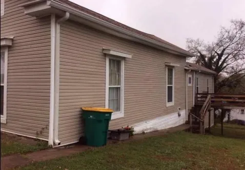 a bathroom with a sink toilet and tub