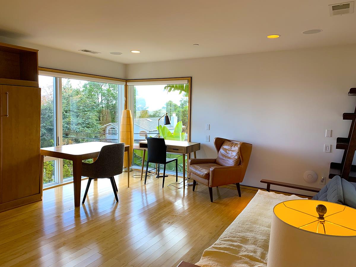 2912 Hillside Drive Burlingame, CA 94010 - Photo 12 of 19 a living room with furniture and a large window