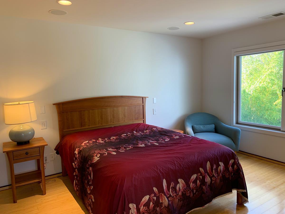 2912 Hillside Drive Burlingame, CA 94010 - Photo 18 of 19 a bedroom with a bed and window