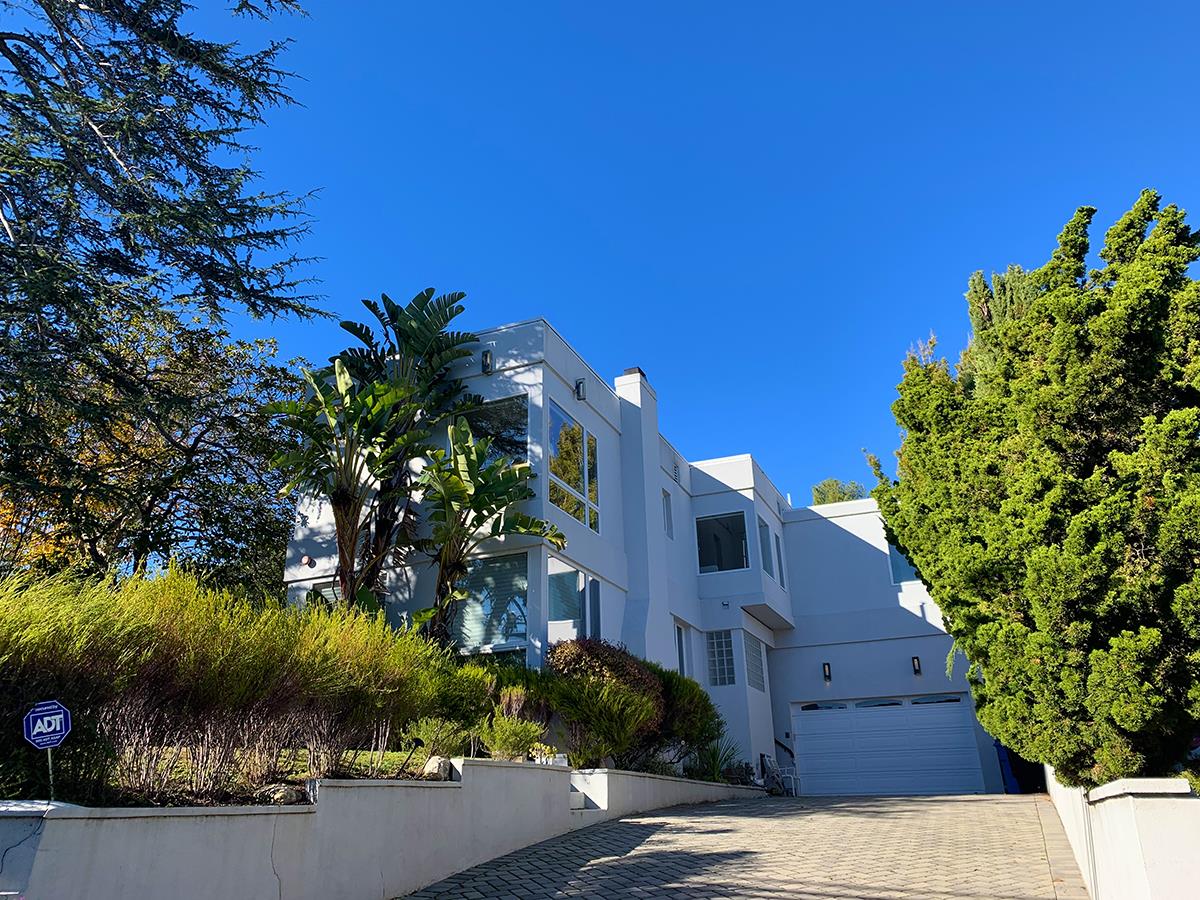 2912 Hillside Drive Burlingame, CA 94010 - Photo 2 of 19 a view of a house with a plants park